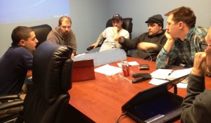 Marlin Steel degreed engineers, machinists discuss solution to a custom steel wire basket design.