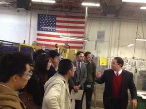 Marlin Steel President Drew Greenblatt gives plant tour to graduate students from Johns Hopkins University Carey Business School