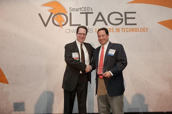 Marlin Steel President Drew Greenblatt accepts a Baltimore VOLTAGE Award for 2013