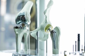 This knee replacement is one example of the orthopaedic parts that medical manufacturing companies may produce.