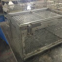 The expanded mesh enclosure protects parts in a maximum-strength steel cage.