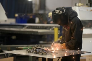 Marlin Employee Working with Steel on the Shop Floor.