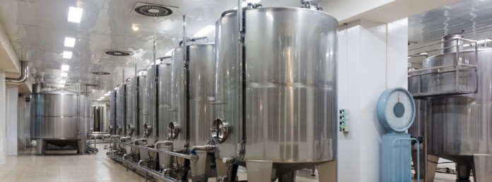 Mirror Finished Stainless Steel Barrels Inside Beverage Processing Plant.jpg