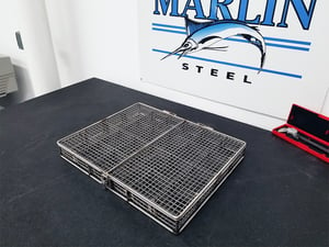 Stainless steel baskets like this one often go through many design revisions using different types of stainless steel.