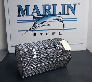 The design of this hexagonal basket takes advantage of stainless steel properties to protect parts held within.