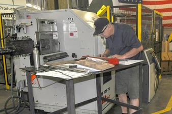 Nathan Myers, Marlin Steel Mechanical Engineer, hard at work on a custom basket design